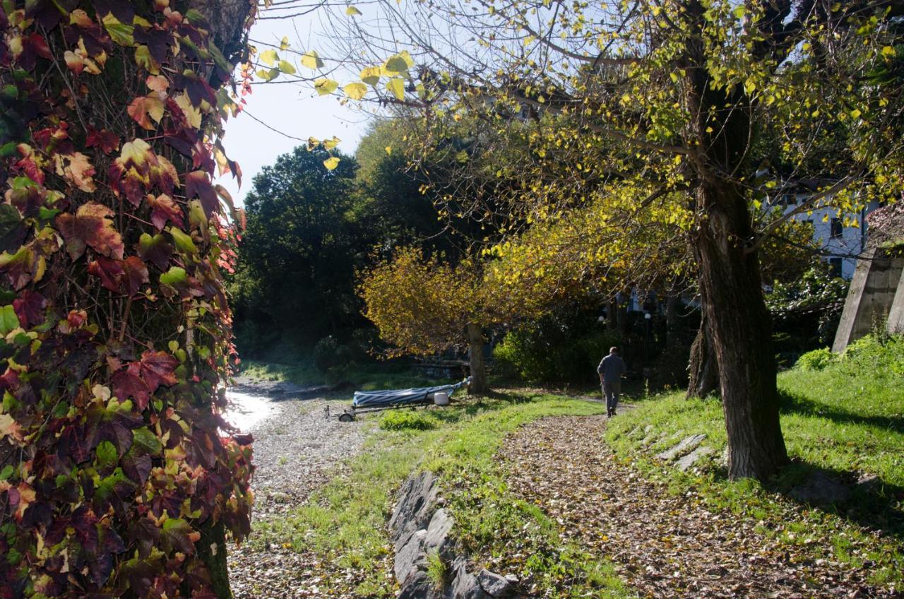 Anma Cottages The Secret Garden Pianello Del Lario Bagian luar foto