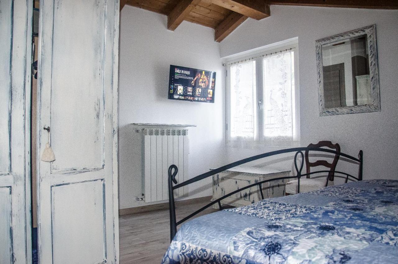 Anma Cottages The Secret Garden Pianello Del Lario Bagian luar foto